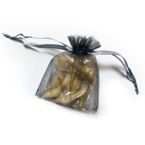 Cute, white chocolate shoe favours made with belgian chocolate