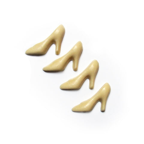 Cute, white chocolate shoe favours made with belgian chocolate