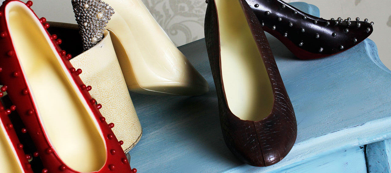 chocolate favours, shoes and baby shoes